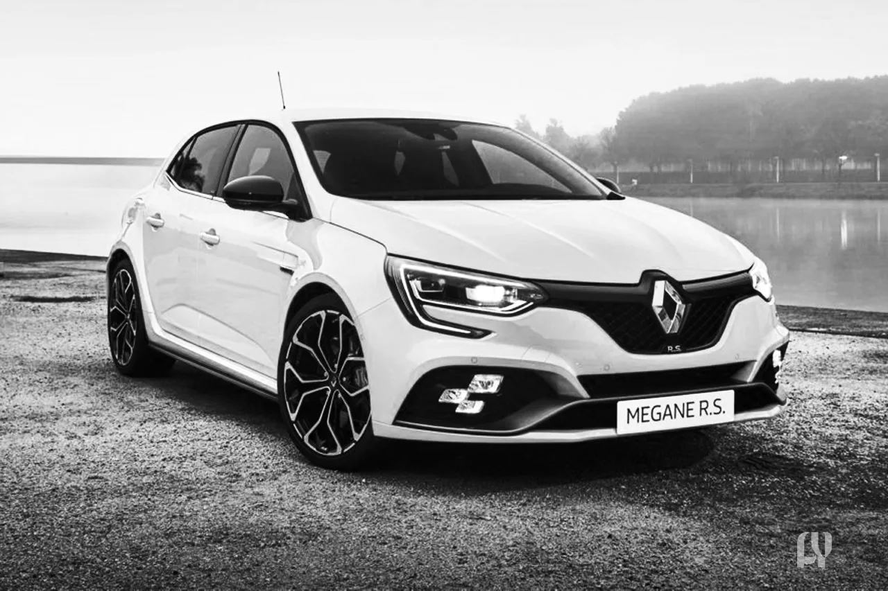Renault Megane RS 300 Trophy speeding on a racetrack.